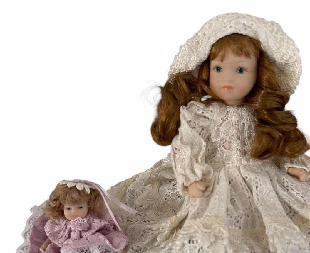 Photo 1 of (3)PCS PORCELAIN DOLL ON BENCH H6”
