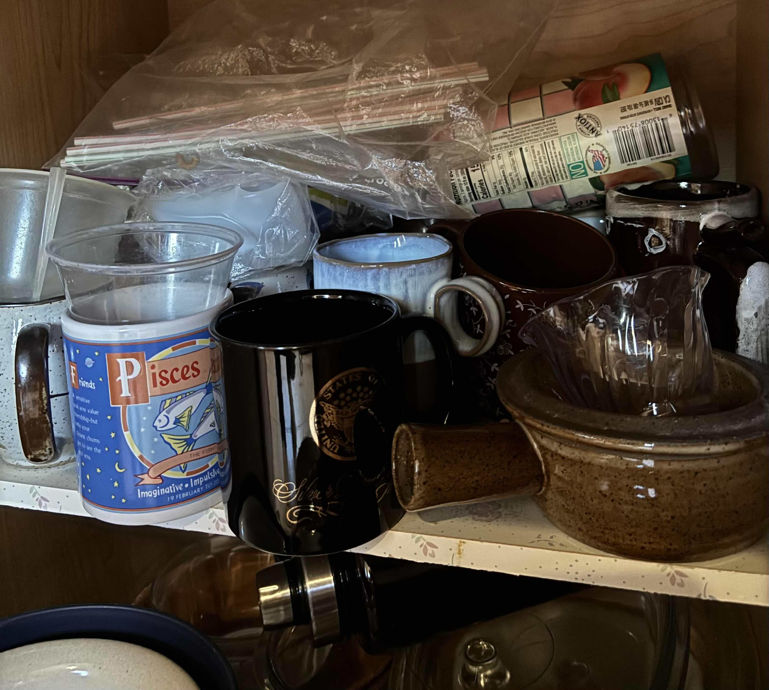 Photo 1 of CONTENTS OF KITCHEN CABINET