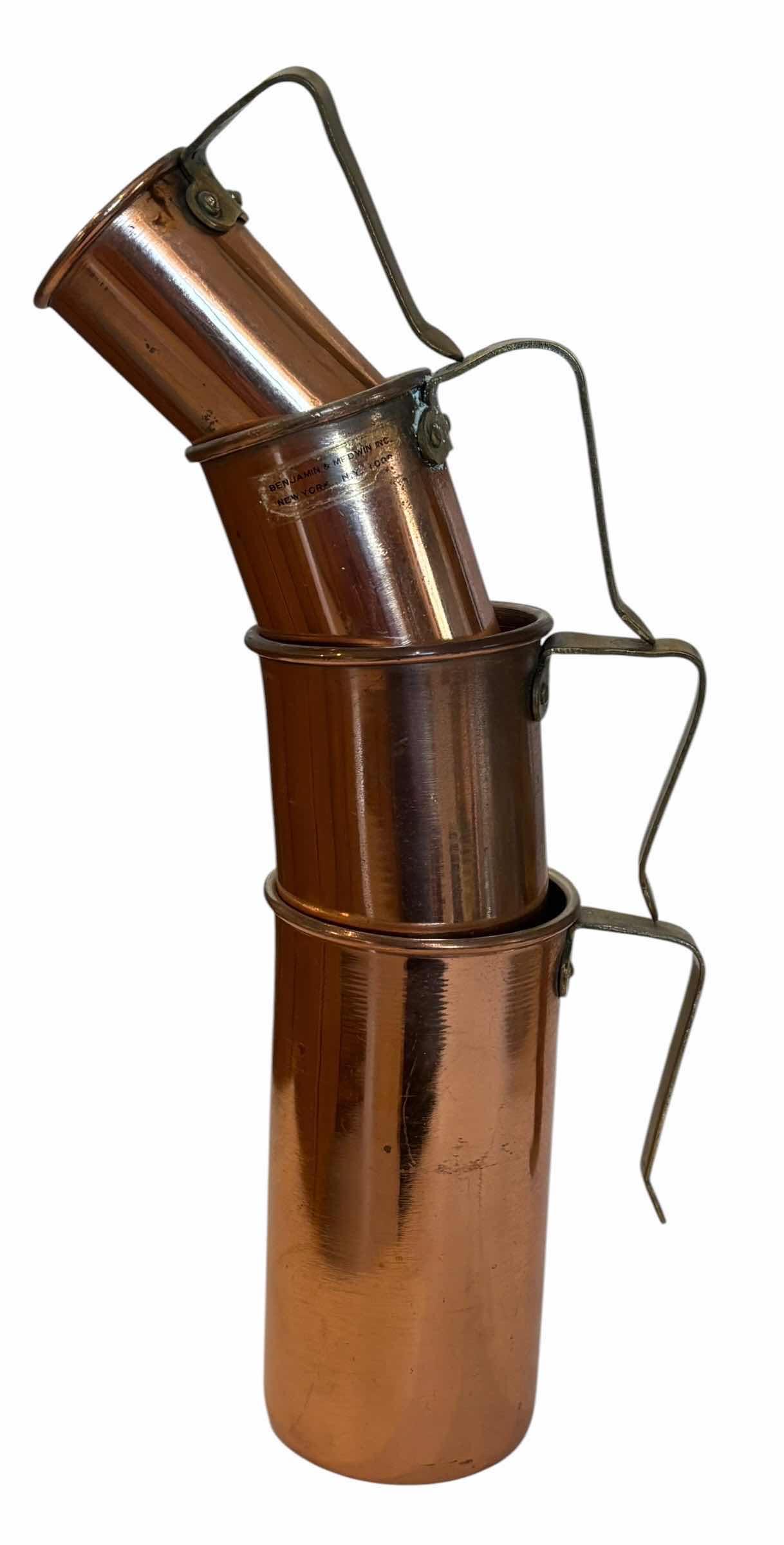 Photo 1 of COLLECTION OF METAL KITCHEN GADGETS: COPPER & BRASS NESTING MEASURING CUPS, FRUIT BOWL WITH HANDLE, FLOUR SIFTER
