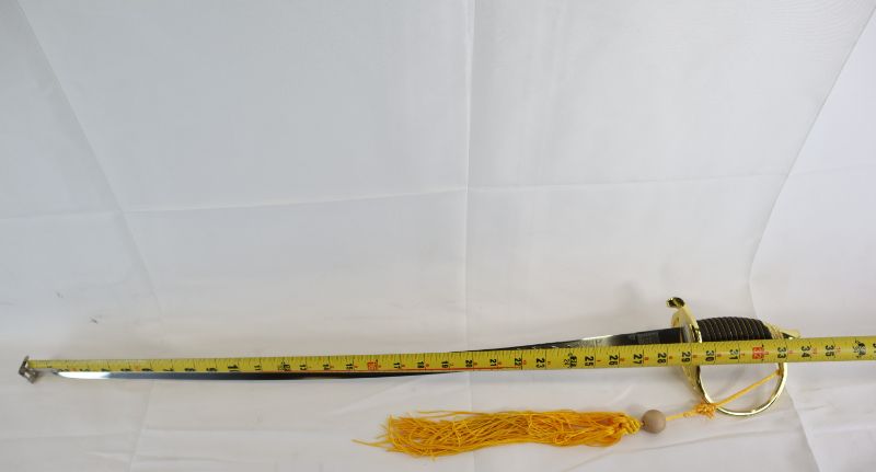 Photo 1 of GOLD AND BLACK DUTCH SWORD WITH TASSLE NEW 