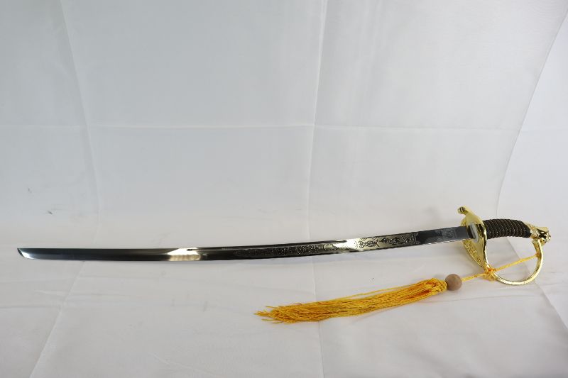 Photo 1 of GOLD AND BLACK DUTCH SWORD WITH TASSLE NEW 