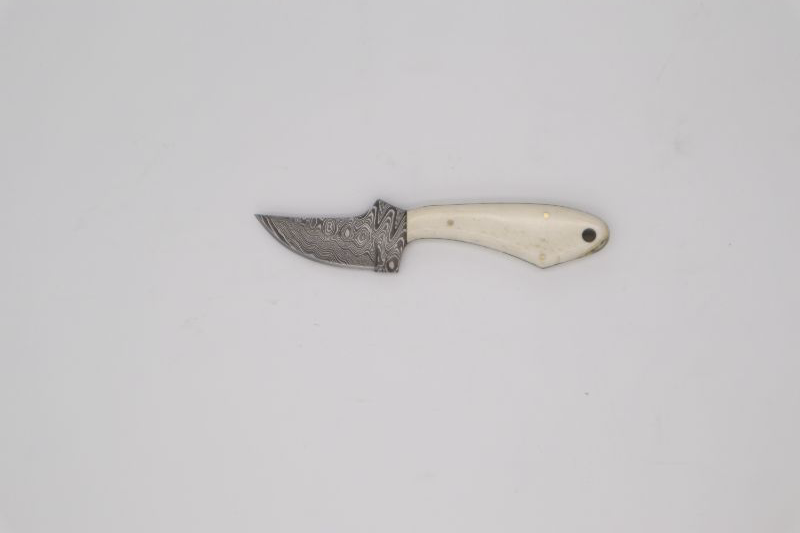 Photo 1 of 6.5 RHINO BONE HND W/SH KNIFE NEW