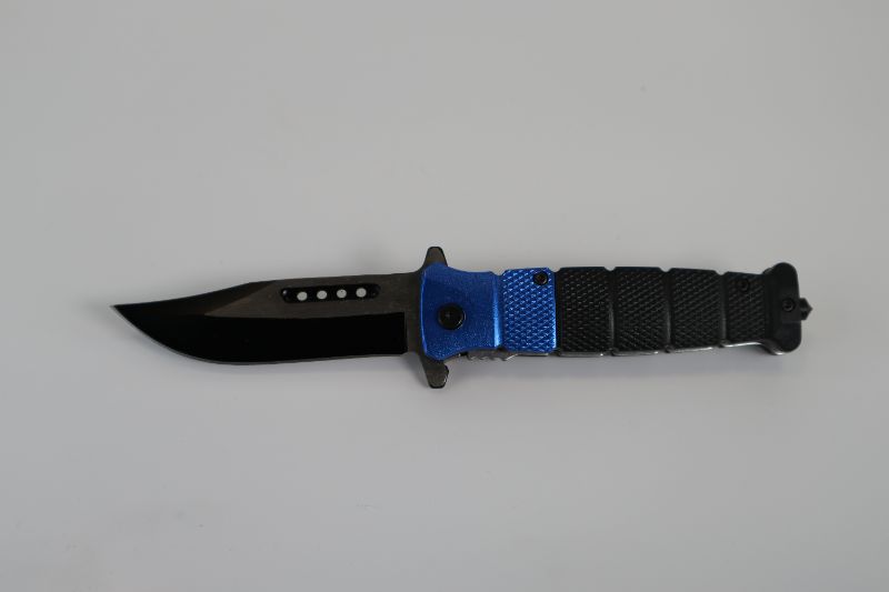 Photo 1 of BLUE AND BLACK POCKET KNIFE NEW 