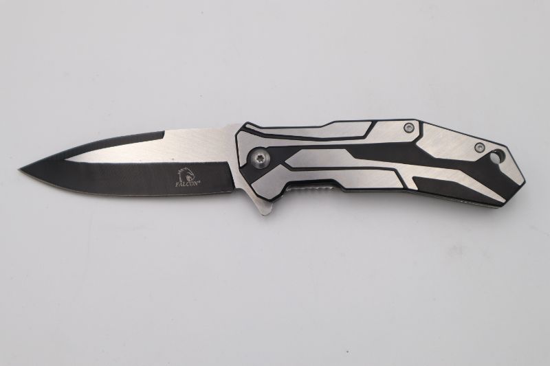 Photo 1 of SILVER AND BLACK WITH PATERN POCKET KNIFE NEW