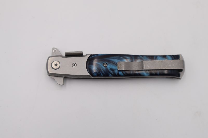 Photo 3 of BLUE AND BLACK SMOKE POCKET KNIFE  NEW