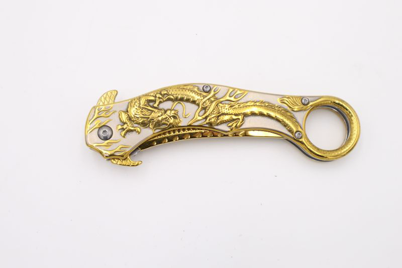 Photo 2 of GOLD AND WHITE CURVED DRAGON POCKET KNIFE NEW 