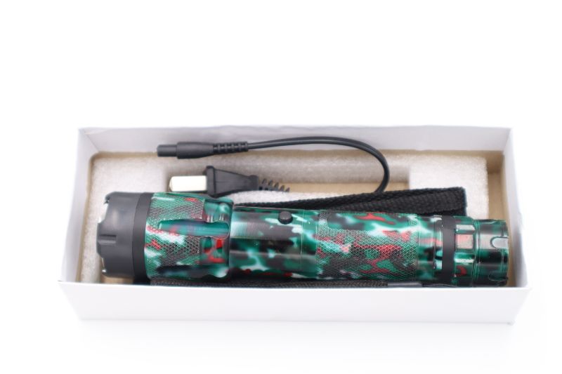 Photo 2 of GREEN CAMO FLASHLIGHT TASER NEW 
