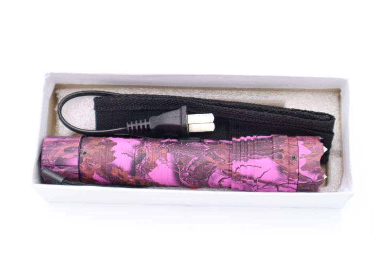 Photo 2 of PINK CAMO LEAF FLASHLIGHT TASER NEW WITH CHARGER