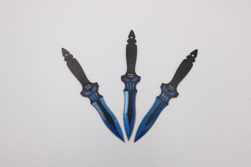 Photo 1 of BLUE AND BLACK SKULL THOWINGG KNIVES NEW
