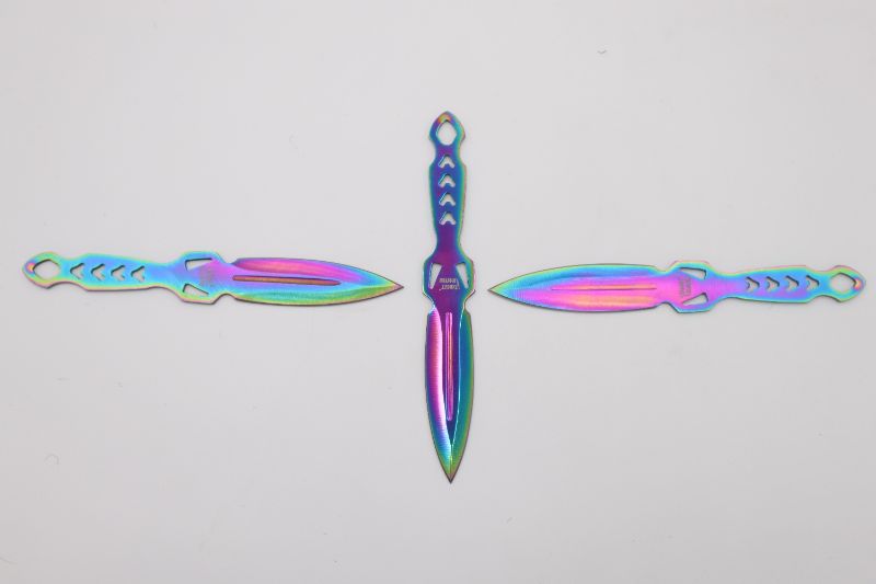 Photo 1 of OIL SLICK THROWING KNIVES NEW