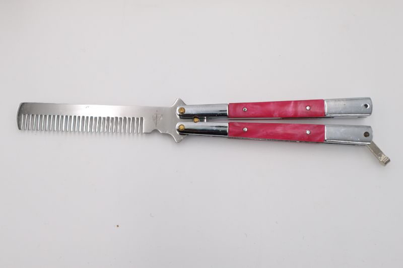 Photo 1 of COMB STYLE BUTTERFLY KNIFE NEW