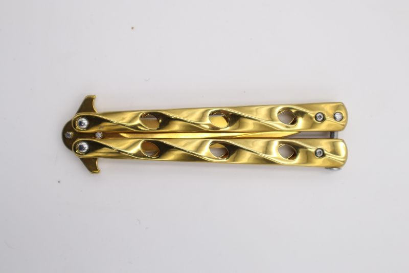 Photo 3 of GOLD BUTTERFLY KNIFE NEW