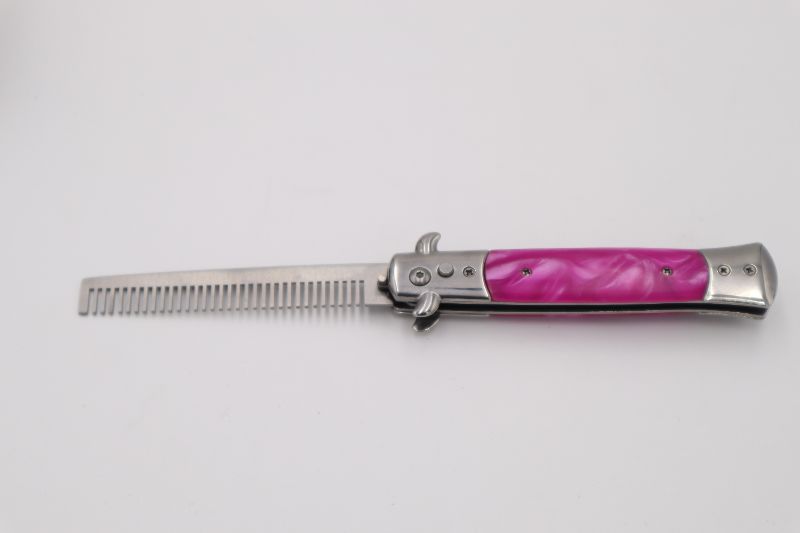 Photo 1 of POCKET KNIFE STYLE PINK COMB NEW