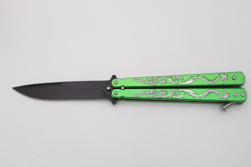 Photo 1 of GREEN STYLE BUTTERFLY KNIFE NEW