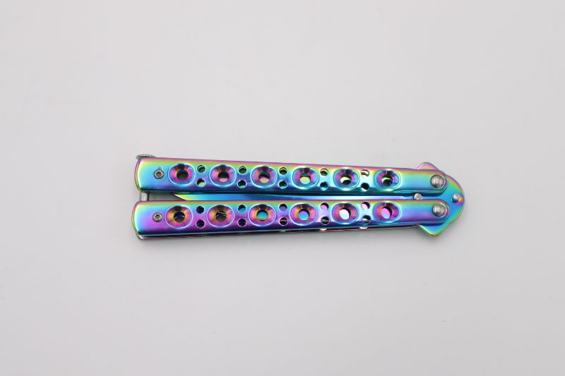 Photo 3 of OIL SLICK BUTTERFLY KNIFE NEW