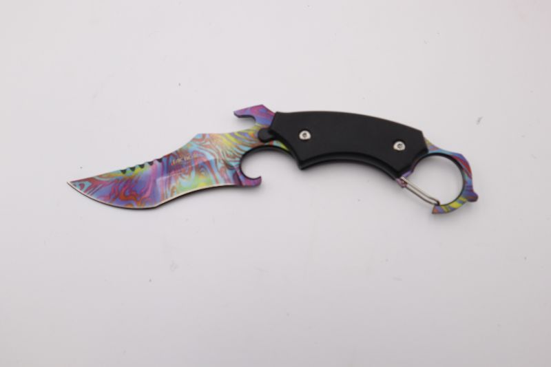 Photo 1 of OIL SLICK CURVED KNIVE WITH CASE AND CLIP NEW 