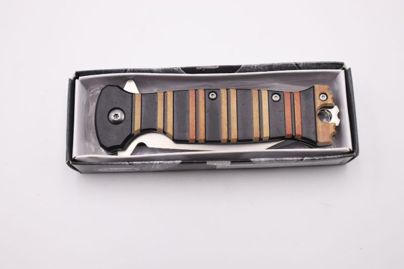 Photo 2 of 4.75 INCH ORANGE STRIPE POCKET KNIFE NEW 