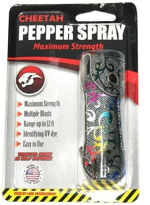 Photo 1 of CHEETAH BRAND PEPPER SPRAY WITH RAINBOW SILVER SPARKLE CARRYING CASE MAXIMUM STRENGTH NEW