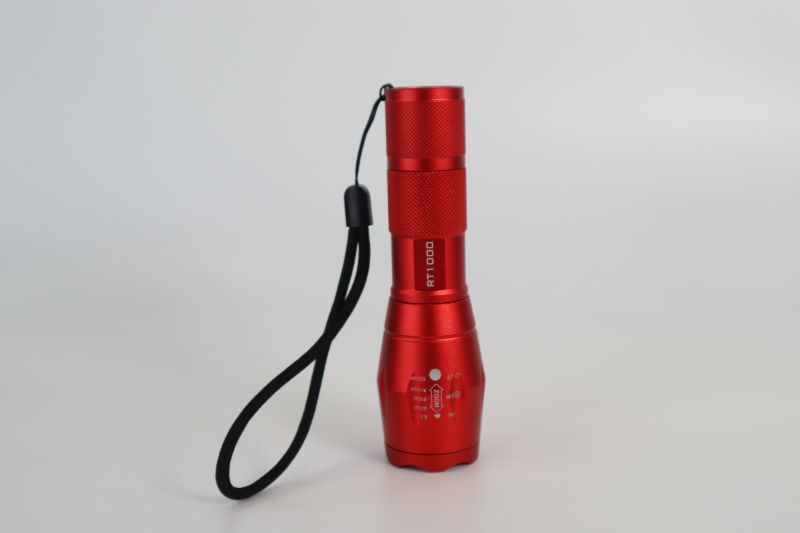 Photo 2 of RT1000 LED METAL FLASHLIGHT WITH ZOOM UP TO X2000 WITH A WRIST STRAP RED NEW 