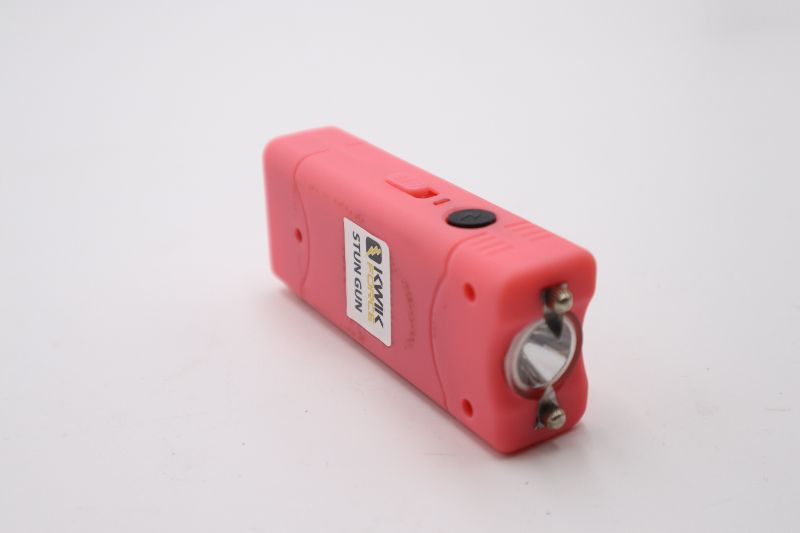 Photo 1 of PINK 3.75 INCH KWIK FORCE STUN GUN AND FLASHLIGHT CARRY CASE ABLE TO LOOP ONTO BELT NEW