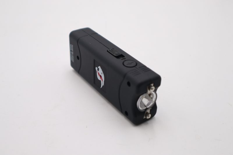 Photo 1 of 4 x 1.3 INCH BLACK MINI STUN GUN WITH FLASHLIGHT AND CARRYING CASE ABLE TO LOOP ONTO BELT NEW