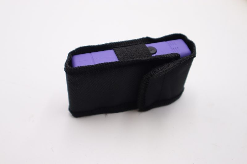 Photo 2 of 4 x 2 INCH PURPLE MINI STUN GUN AND FLASHLIGHT WITH CARRYING CASE ABLE TO LOOP ONTO BELT NEW