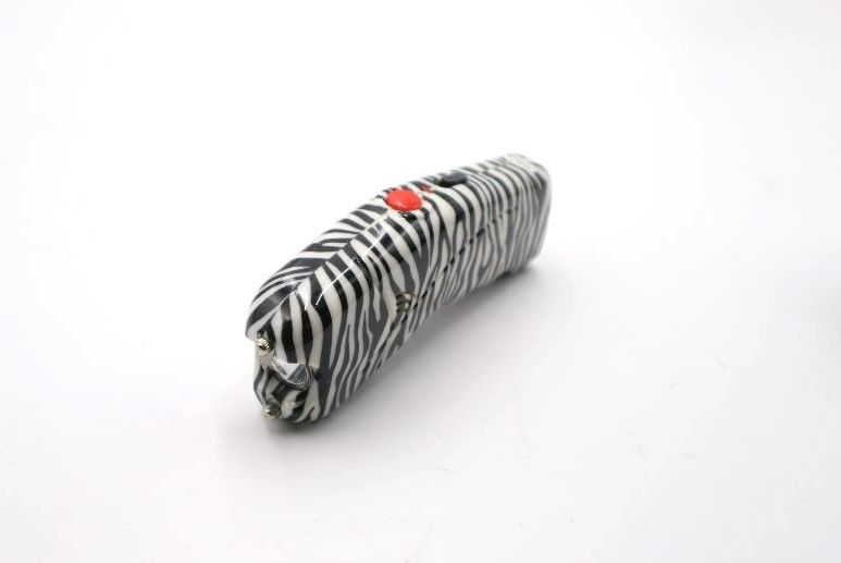 Photo 2 of MINI ZEBRA PRINT LED FLASHLIGHT AND STUN GUN NEW