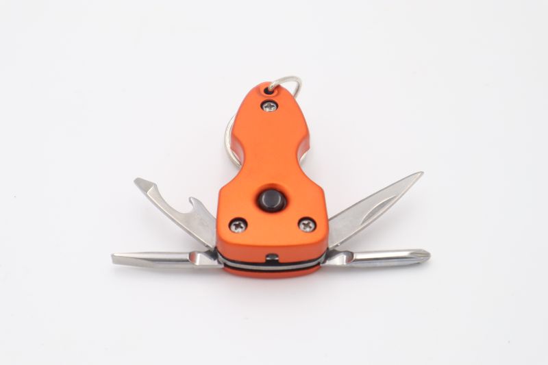 Photo 1 of TACTICAL SURVIVAL POCKET MULTI TOOL KEYCHAIN WITH FLASHLIGHT KNIFE BOTTLE OPENER AND A FLAT HEAD AND PHILPS HEAD SCREWDRIVERS ORANGE NEW 

