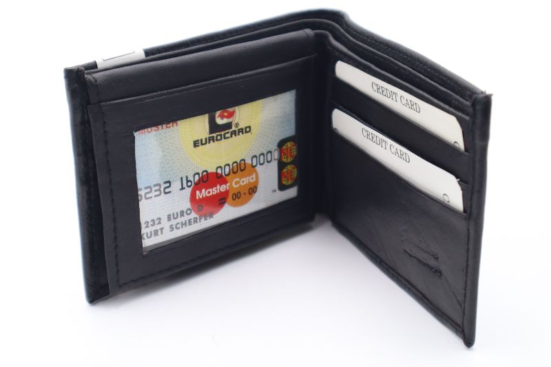 Photo 2 of BLACK BI-FOLD GENUINE LEATHER WALLET WITH 4 CARD SLOTS WITH 2 PLASTIC SEE THROUGH CARD SLOTS AND 2 SECTIONS FOR BILLS NEW 