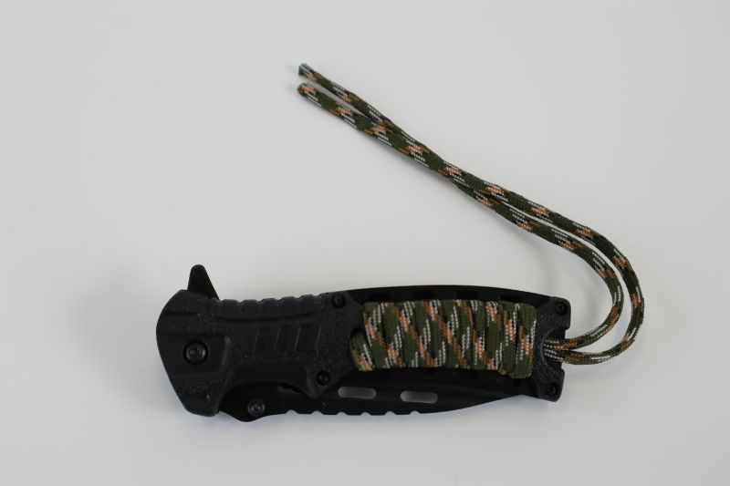 Photo 1 of BLACK POCKET KNIFE WITH CAMO ROPE STRING ATTACHED NEW