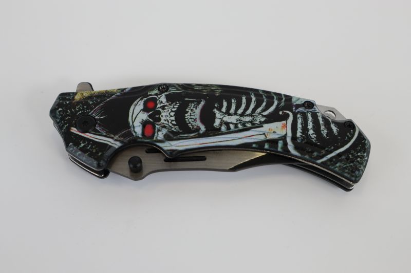 Photo 2 of SKULL WITH RED EYES AND SWORD POCKET KNIFE NEW 