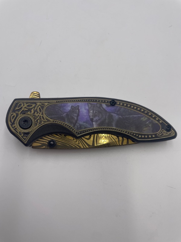 Photo 1 of WOLVES WITH PURPLE BACKGROUND AND ZEBRA PRINT BLADE GOLD POCKET KNIFE NEW  