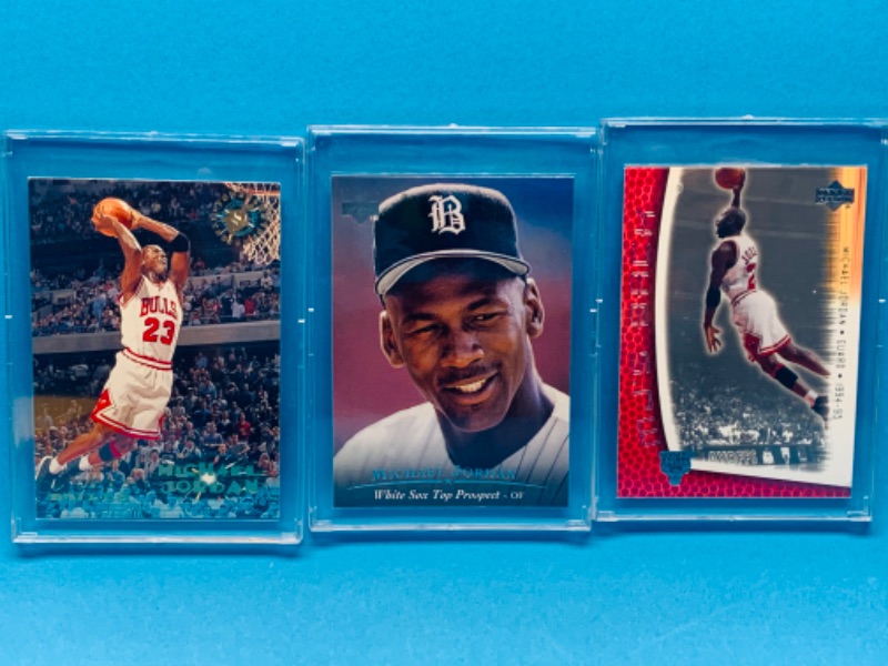 Photo 1 of 257574… 3 collectible Michael Jordan cards in hard plastic cases 