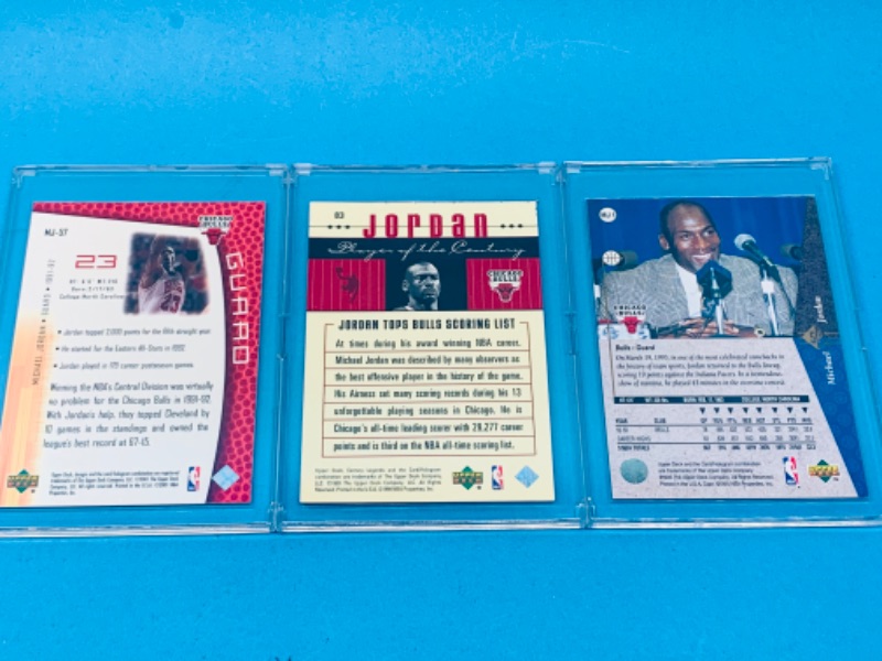 Photo 2 of 257575… 3 collectible Michael Jordan cards in hard plastic cases 