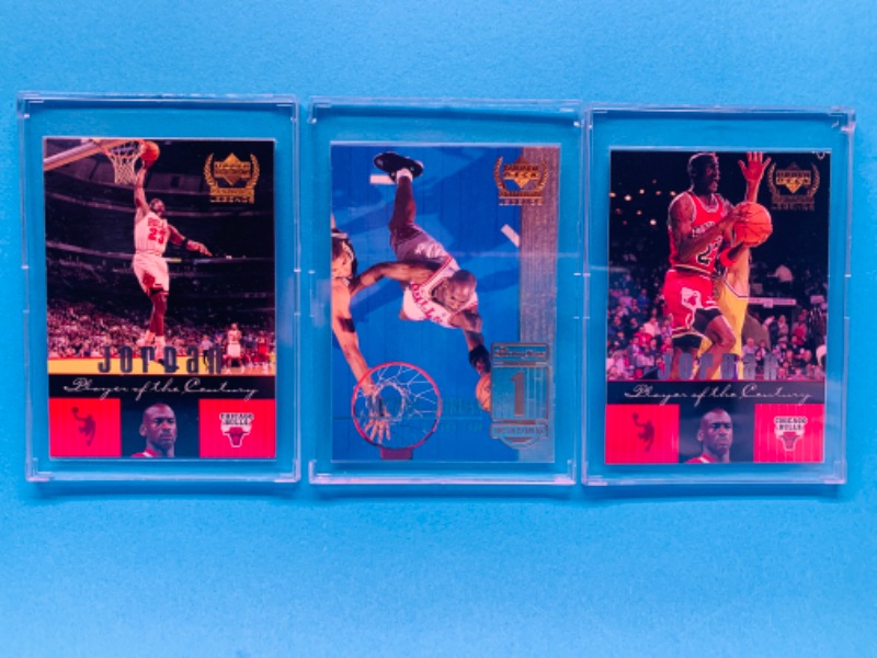 Photo 1 of 257580… 3 collectible Michael Jordan cards in hard plastic cases 