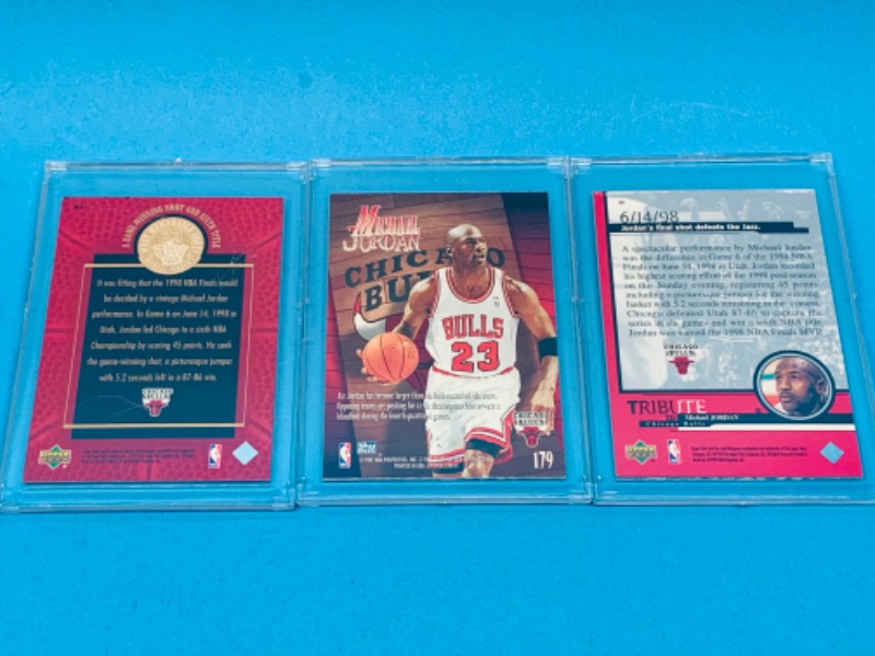 Photo 2 of 257581… 3 collectible Michael Jordan cards in hard plastic cases 