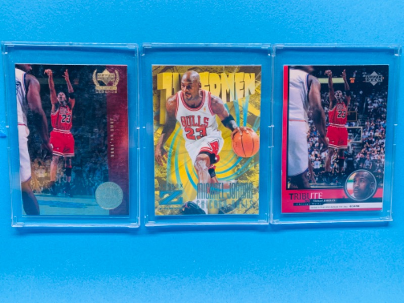 Photo 1 of 257581… 3 collectible Michael Jordan cards in hard plastic cases 