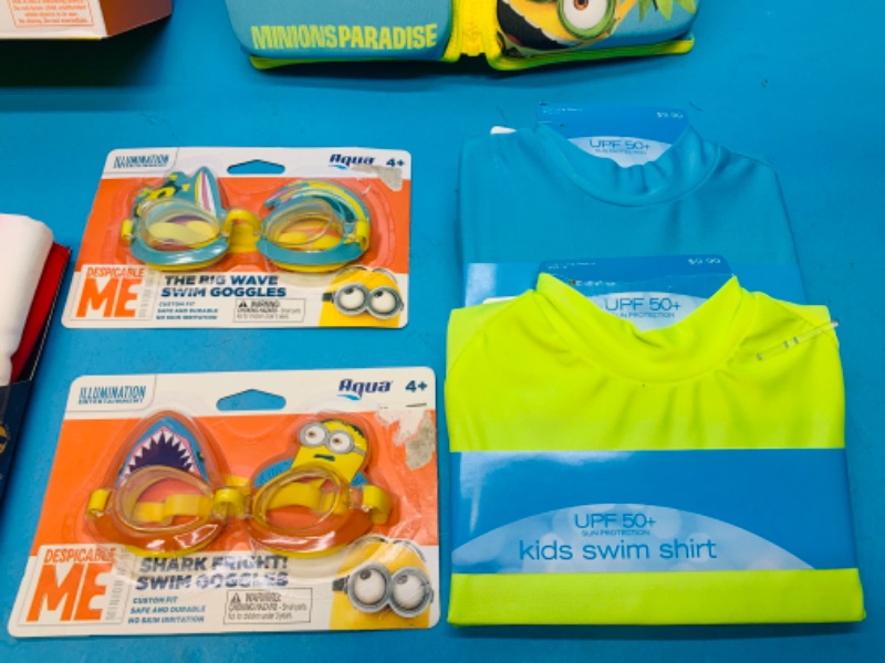 Photo 3 of 257712…8 pcs -giant palm leaf inflatable, minions swim vest, goggles, arm bands and 2  swim shirts size s and m