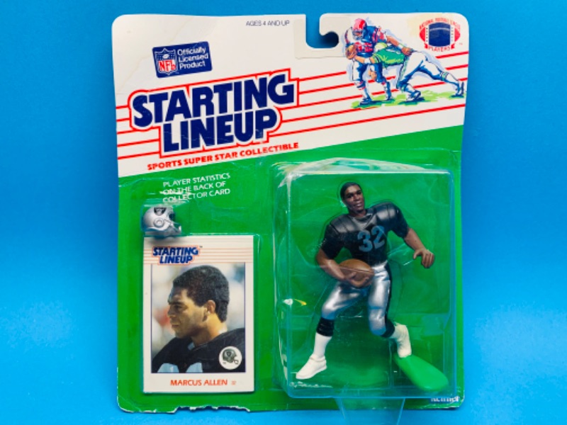 Photo 1 of 257764…starting line up Marcus Allen football figure- damage on bottom corner of pkg 