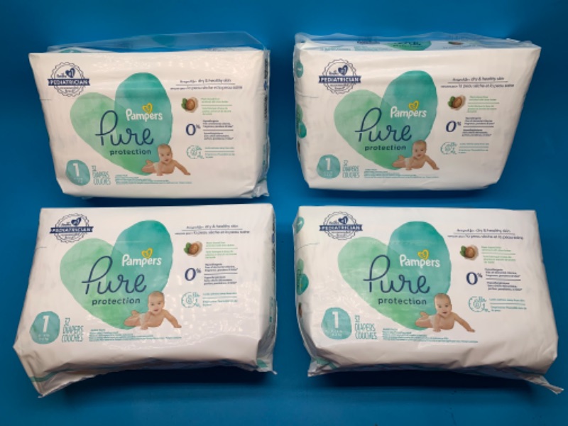 Photo 1 of 257835… 128 Pampers pure protection diapers size 1 - four packs of 32 