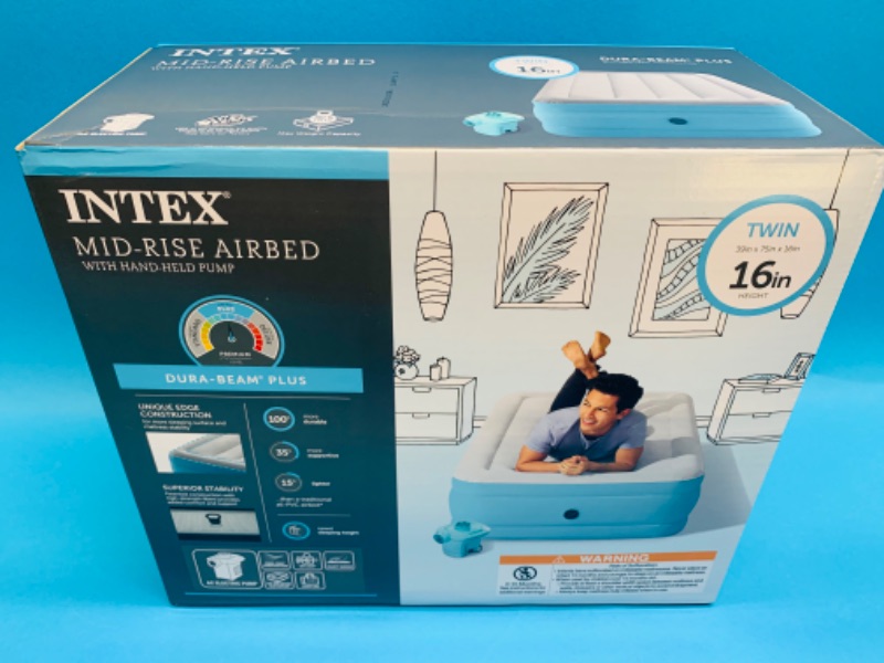 Photo 2 of 258025… Intex 16” twin mid rise air bed with hand held pump 