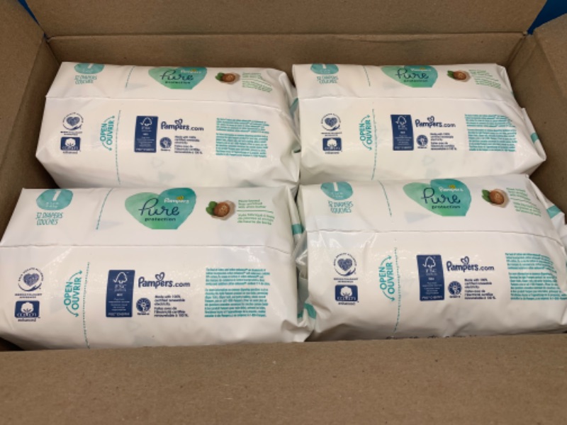 Photo 2 of 258125… 128 Pampers pure protection diapers size 1 - four packs of 32 