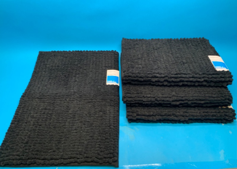 Photo 1 of 258357… 4 memory foam bath mats 17 x 24”