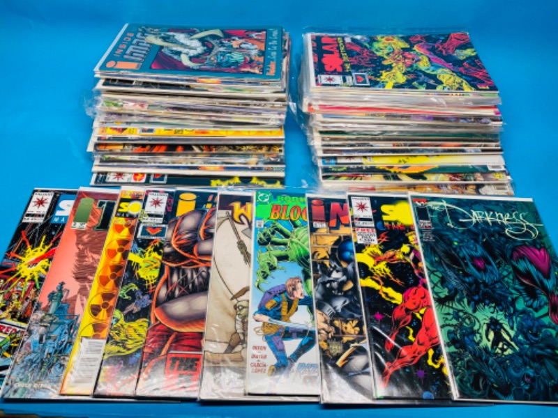 Photo 1 of 258726…70 misc comics in plastic sleeves 