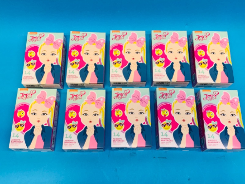 Photo 1 of 258767…10 boxes of fun designs adhesive bandages- 14 per box 