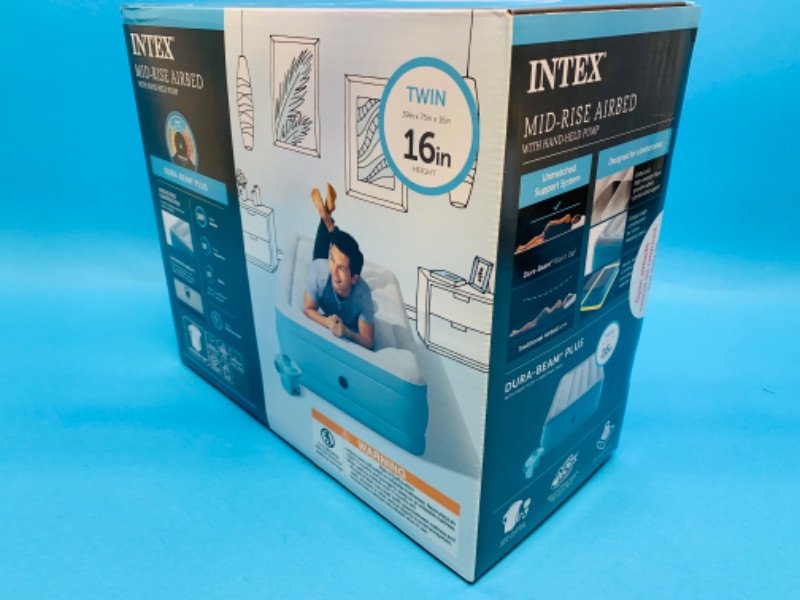 Photo 3 of 259581… Intex twin 16” mid rise air bed with hand held pump 