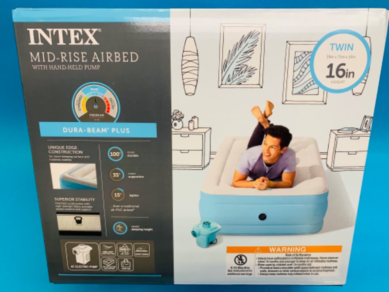 Photo 1 of 259581… Intex twin 16” mid rise air bed with hand held pump 