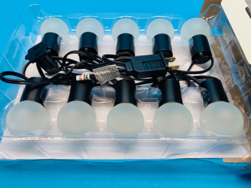 Photo 1 of 259751…  box of string lights. 10 light bulbs 10 foot length connect 8 strands end to end 