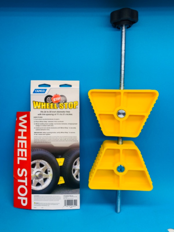 Photo 1 of 259774… Camco Small RV Wheel Stop | Features a Lightweight Heavy-Duty Design with a Rubber Handle, Prevents Shifting of Trailer Tandem Tires while Parked or Re-Hitching, and Fits 26” to 30” Tires (44652) Small Wheel Stop Single Pack