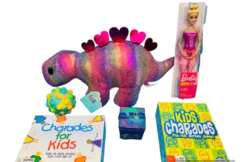 Photo 1 of 259978…6 piece Barbie, Dino plush, charades games and fidget toys
